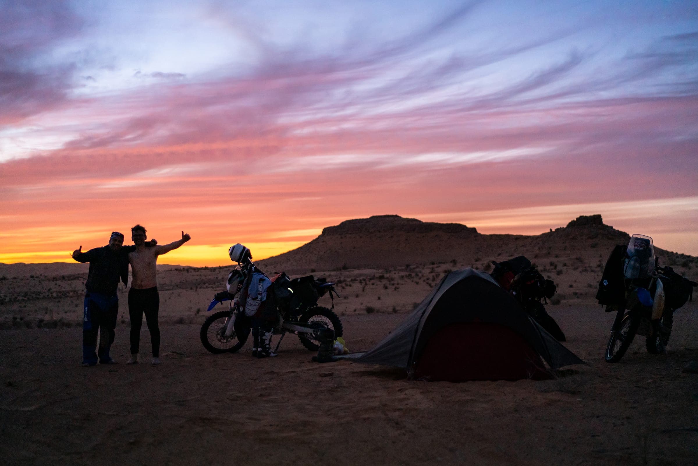 Desert camp at sunset